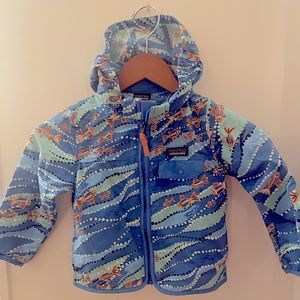Patagonia fish rain jacket size 3T - note small patch under hood
